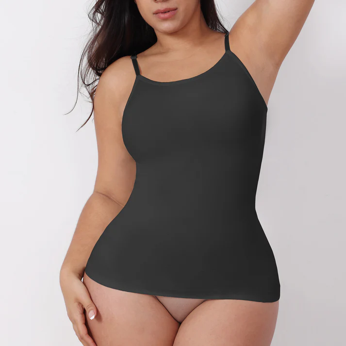 Black tank top worn by a person on a plain background