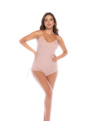 Woman wearing a light pink bodysuit on a white background